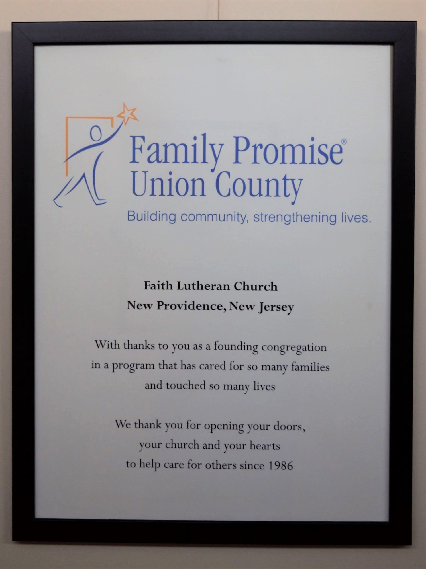 Family Promise sign in hallway 